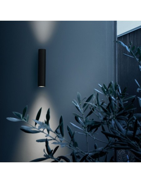 Aplique de Pared Flauta Flos: Diseño Elegante con Emisión Doble de Luz